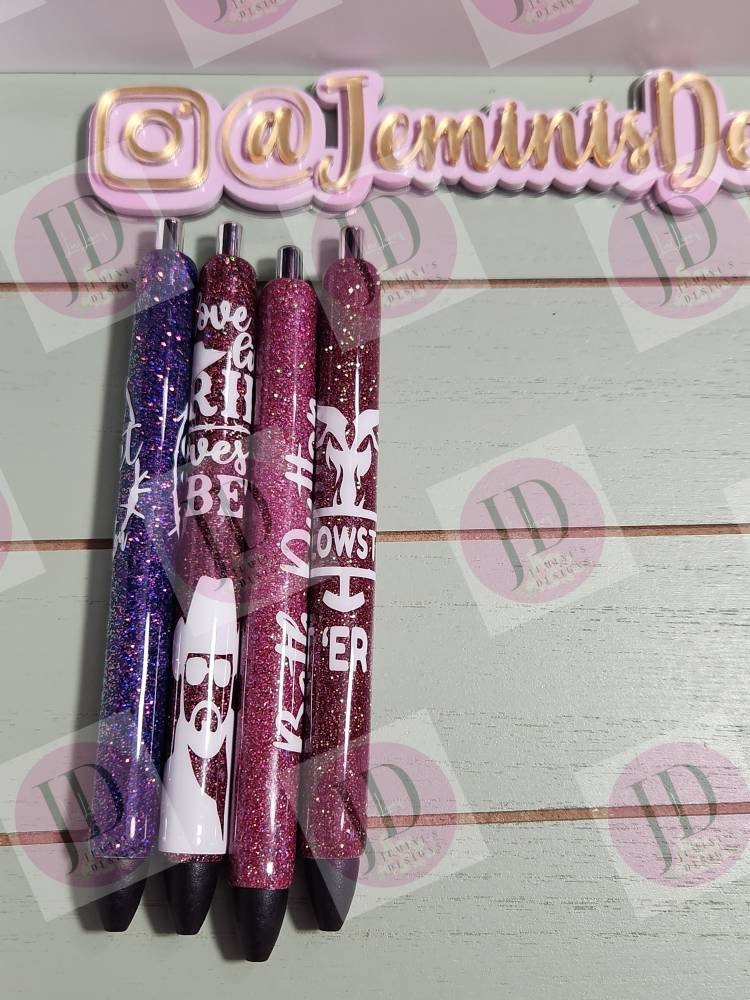 Set of 4 cowboy inspired glitter pen.  Purple and various shades of pink. Open pictures to see pen titles or video