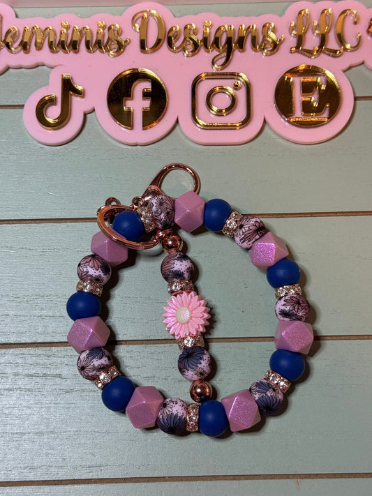 Floral mauve and blue fall leaves beaded wristlets keychain, with daisy keychain bar, and bling.  Bangle wristlets floral fall colors