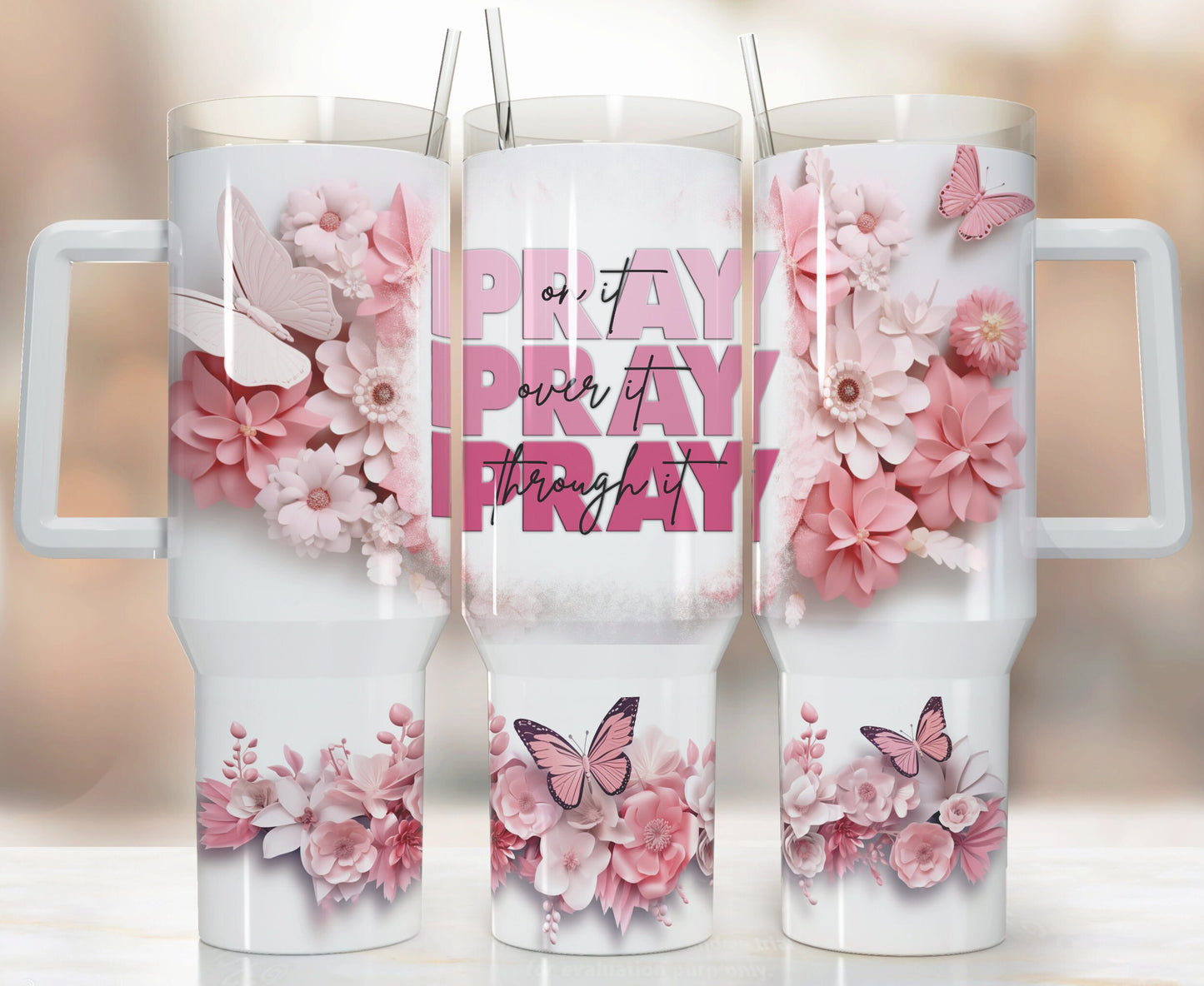 Pray on it, over it, through it 40oz sublimated SS tumbler.  Vibrant flowers and butterflies 40oz tumbler