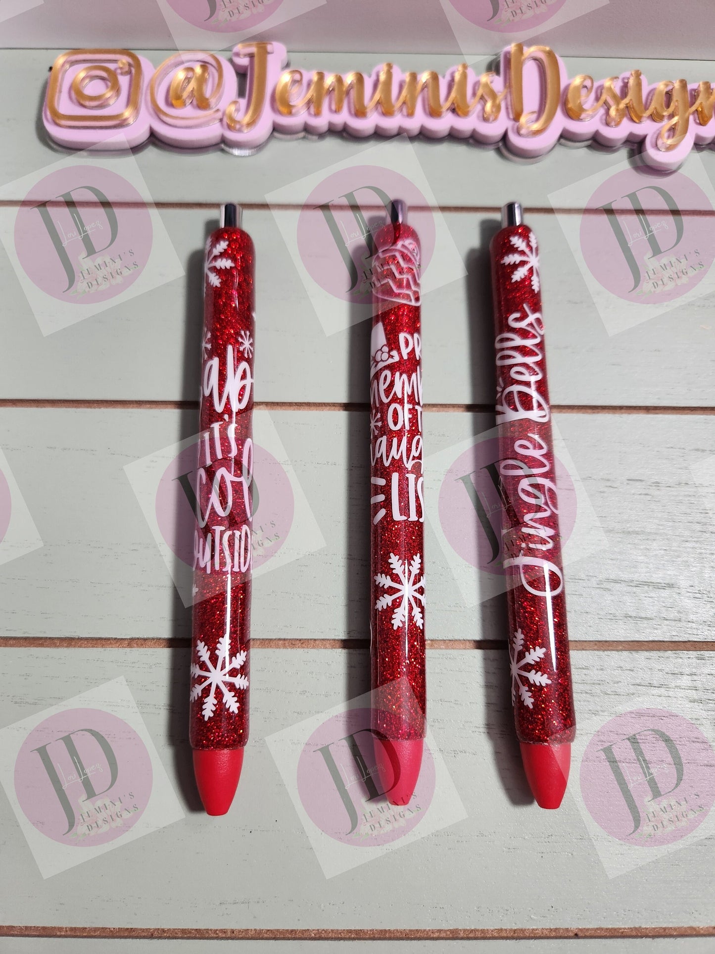 Set of 3 red glitter with white decals. Baby its cold outside/jingle bells/ proud member of the naughty list.  Glitter Gel pens/ refillable