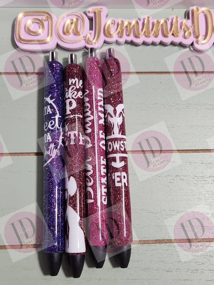 Set of 4 cowboy inspired glitter pen.  Purple and various shades of pink. Open pictures to see pen titles or video