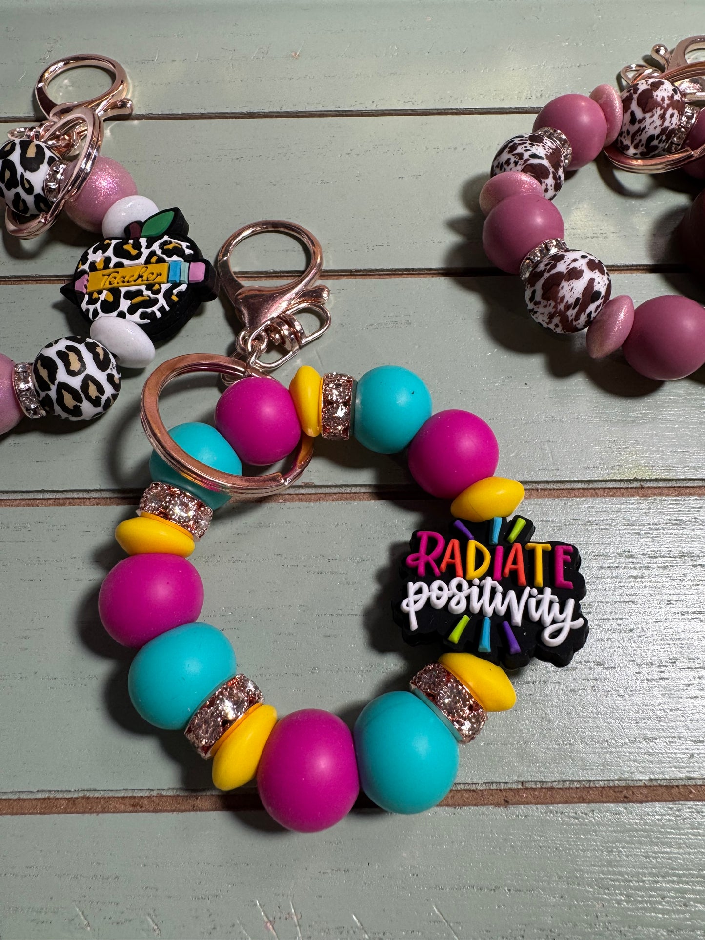 Beaded mini keychain, choice of design/teach apple bead/radiate positivity or Howdy dangle keychains