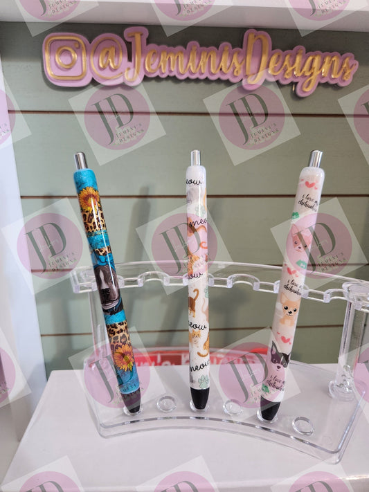 Cats & dogs pen wrap pens.  Pitbull turquoise wrap with Lots of vibrant colors.  White cat resin pen/ white chihuahuas resin pen, only 1 pen