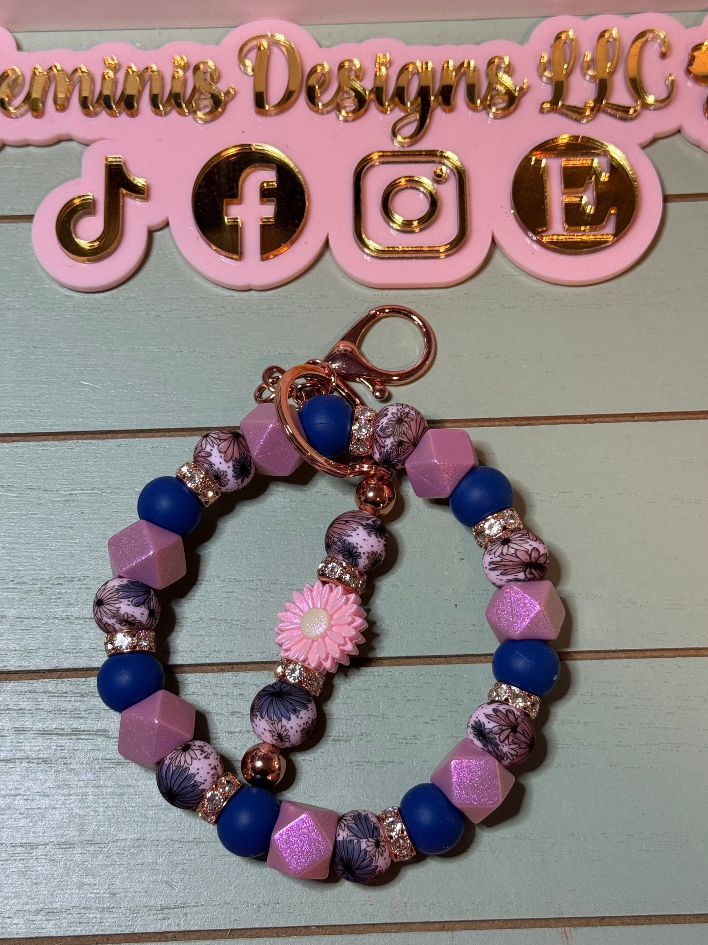 Floral mauve and blue fall leaves beaded wristlets keychain, with daisy keychain bar, and bling.  Bangle wristlets floral fall colors