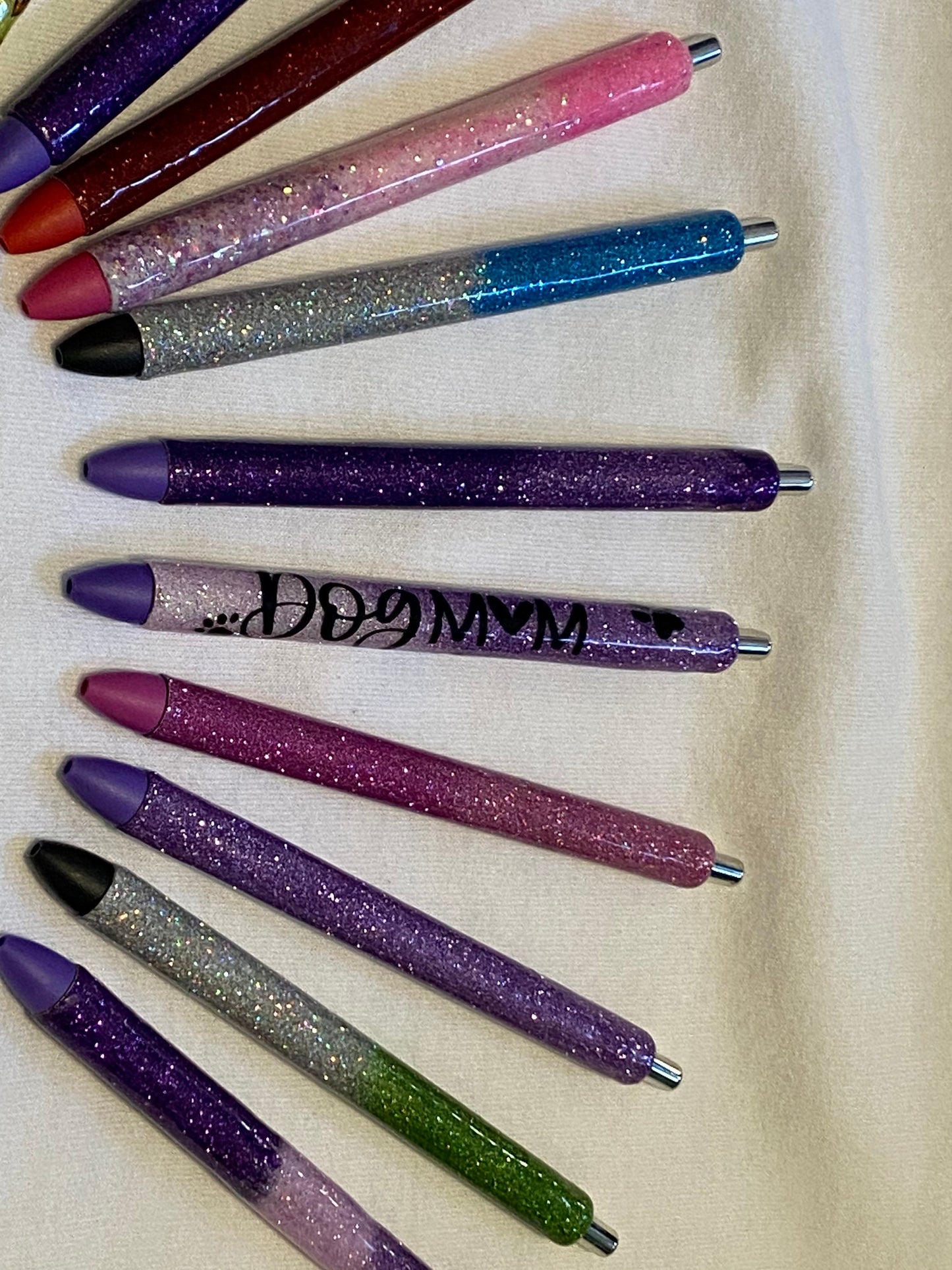 Pens ready for personalization.  Many options to choose from. One pen for the listing price.  Green, purple, blue, glitter UV Resin pens